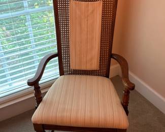 Carved wood throne armchair with cane back