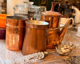 Vintage copper pots and serving vessels