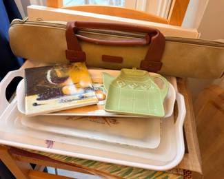 Vintage green ceramic teapot, serving trays and luggage