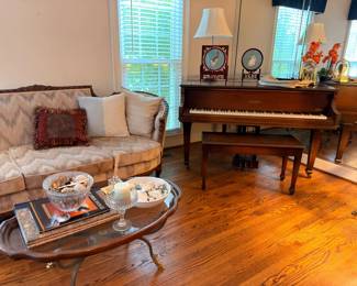 Whitney baby grand piano with Victorian settee