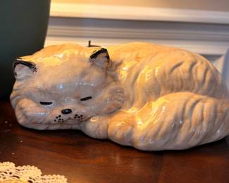 Large ceramic sleeping cat figurine