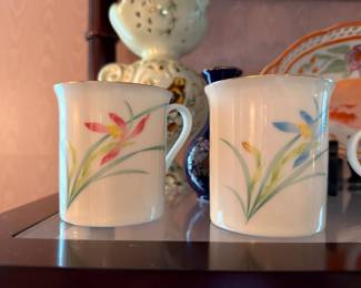 Hand-painted floral porcelain mugs, pair