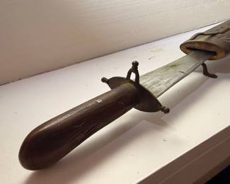 Antique sword with wood handle, close-up