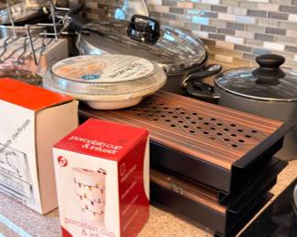 Porcelain tea infuser cup and kitchen items