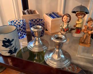 Silver candlesticks, Hummel figurines and blue glass