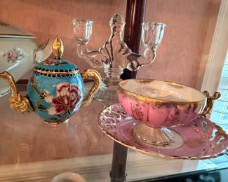 Ornate gold trim teapot and pink teacup set