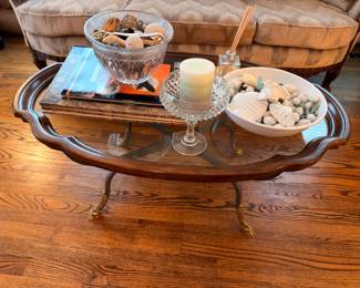 Mahogany oval coffee table with claw feet