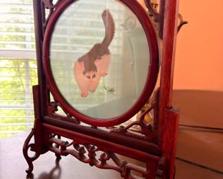 Carved rosewood Asian fire screen with painted panel