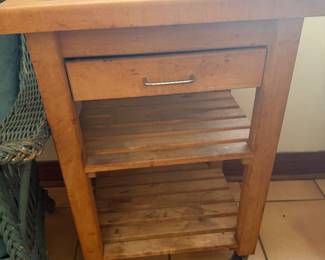 Butcher block cutting board on wheels