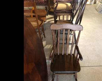 Antique mahogany Childs rocking chair.