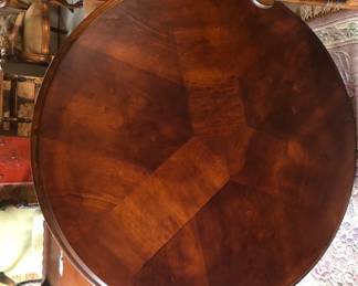 42” round table with 3 piece base, beautiful grain on table top.