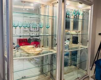 Pair of Silvertone display cabinets with glass shelves