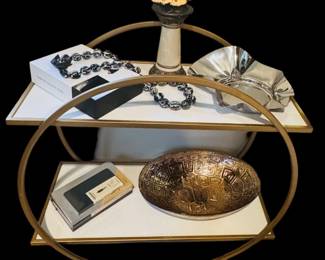White and brass display table