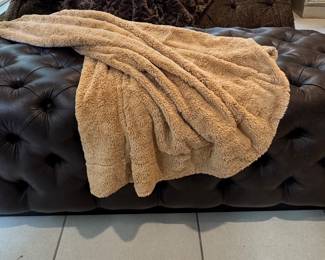 Tufted brown ottoman