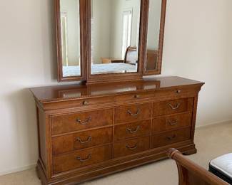 Thomasville 12 drawer credenza with tri-fold mirror and hidden jewelry compartment (we believe this bedroom set is from the Elysee Collection)