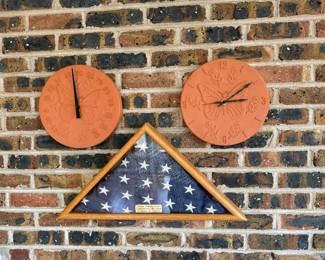 Terra cotta thermometer and clock; flag