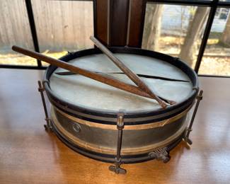 Very old drum and drumsticks