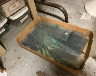 Assorted Stained Glass Pieces and Model Train Parts