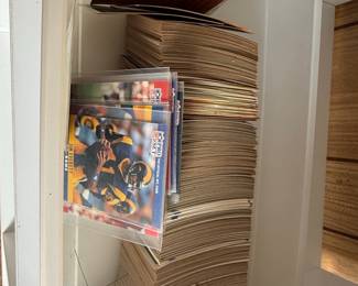 Collection of NFL Football Trading Cards featuring Jim Everett and Manny Trillo