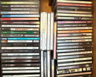 Assorted Music CDs Collection - Rock, Hip-Hop, and Pop