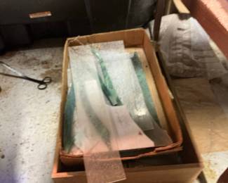 Assorted Stained Glass Pieces and Model Train Parts