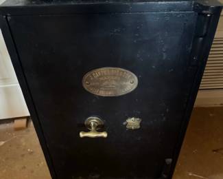 Manufacturer: J. Cartwright & Son. Origin: West Bromwich, England Established Date: 1844 Type: Antique iron safe, often featuring ornamental hardware.