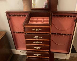 Large jewelry chest in great condition - opens on top and sides, with drawers