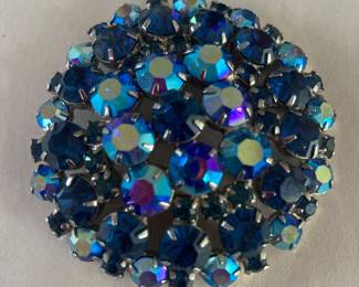 Large prong set rhinestone brooch