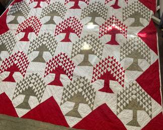 Primitive tree of life hand stitched quilt white places shown on photo are from sunlight coming through window 