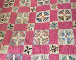 Hand stitched vintage quilt