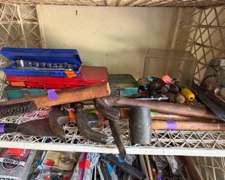 Various tools - hammers, wrench sets, screwdrivers