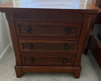 Traditional Dark Wood Nightstand with Three Drawers
