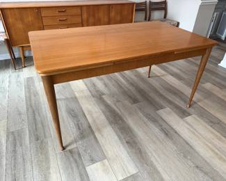 Mid-Century Modern Dining Table with hidden extendable leaves