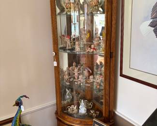 corner curio cabinet in excellent shape