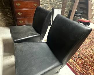 Pair of Black Leather Armless Chairs