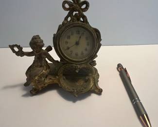 New Haven Cherub Figural Mantel Clock