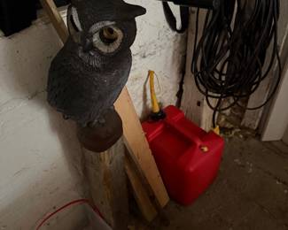 Owl decoy and gas can 