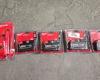 2526  M28 Red Lithium Milwaukee Battery Packs and Charger 