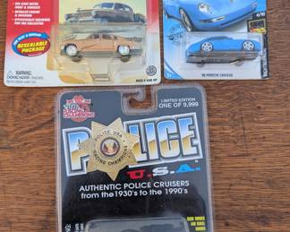 hot wheels & similar. there are also stuffed monkeys. 