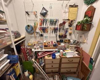 Assorted supplies and inventory from a custom invitation and stationary business.