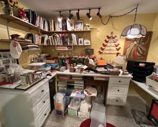 Assorted supplies and inventory from a custom invitation and stationary business.