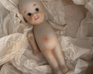 vintage porcelain or bisque Kewpie dol