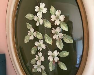 vintage oval-framed wall plaque featuring painted dogwood flowers
