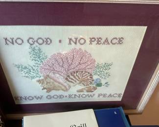 framed cross-stitch artwork