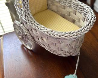 decorative miniature white wicker baby carriage