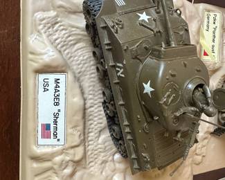 collectible model of an M4A3E8 Sherman tank from the USA