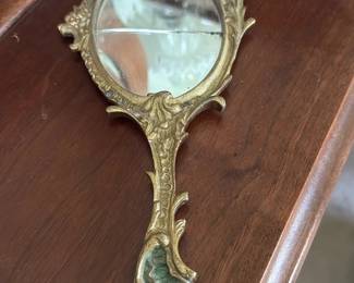 antique ornate hand-held vanity mirror