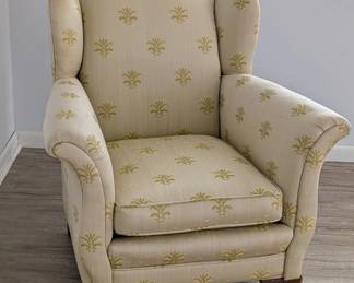 Vintage upholstered wingback chair