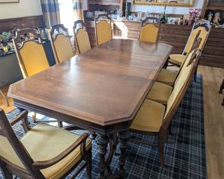 Antique dining table with two leaves and 10 upholstered chairs (2 Captain and 8 regular)