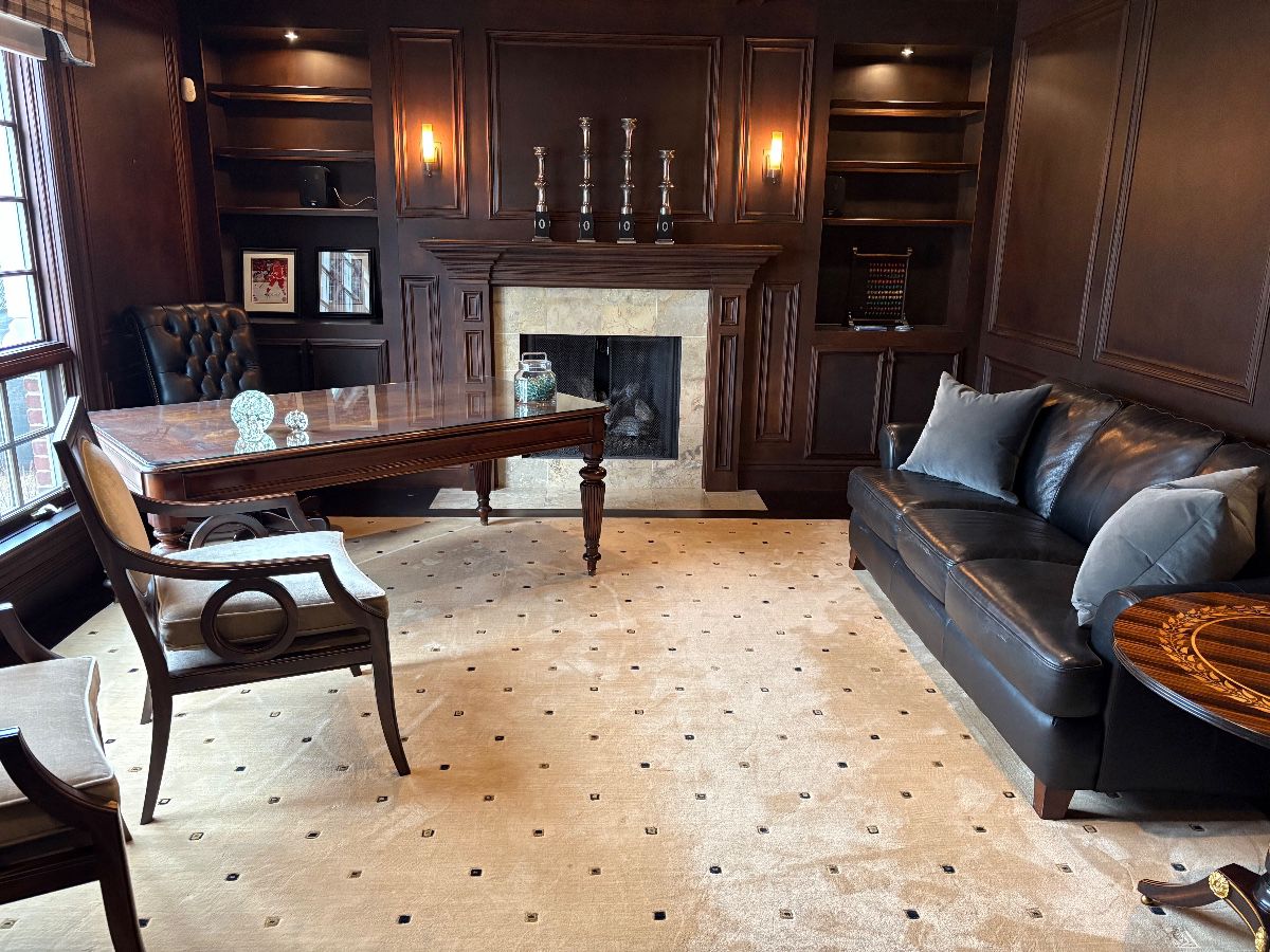 Executive desk (40" x 70") with glass top, Hancock & Moore black leather office chair, Area Rug (12' x 12'), 3-cushion pebbled Italian leather couch with attached back cushions, Baker Round Pedestal table - Historic Charleston Collection, velvet pillows with down inserts, and matched set of wood armchairs - custom fabric - Design Center